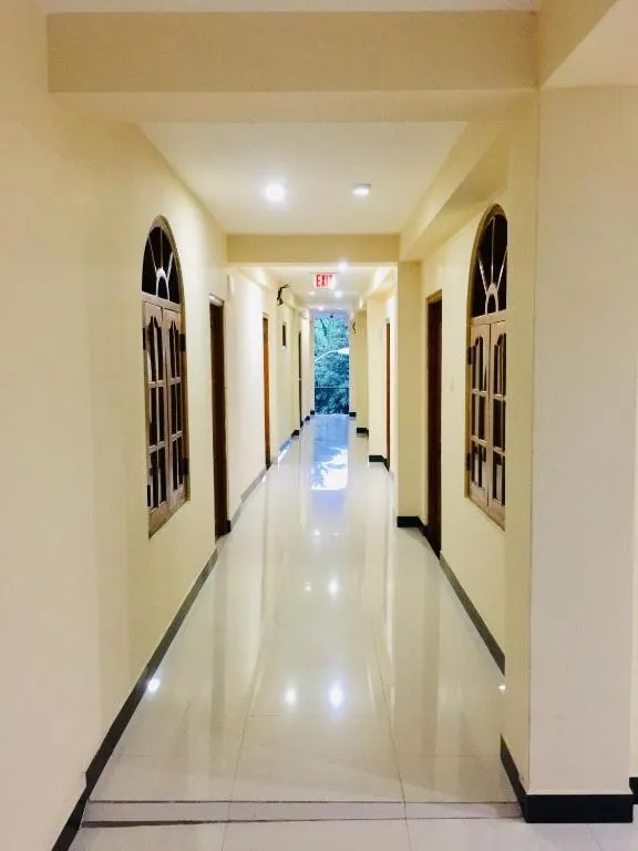 Clean, bright corridor leading to the guest rooms