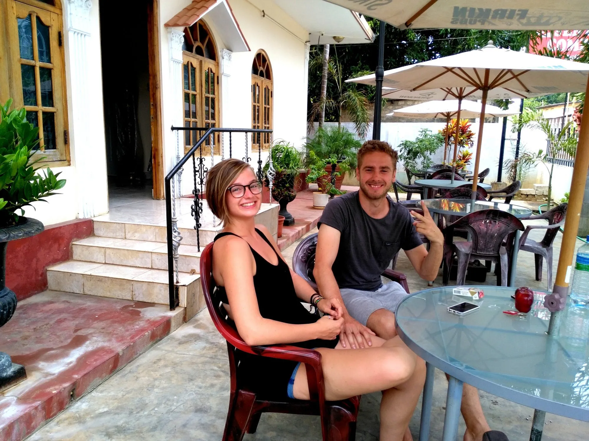 Guests relaxing on the patio at Senthil Complex